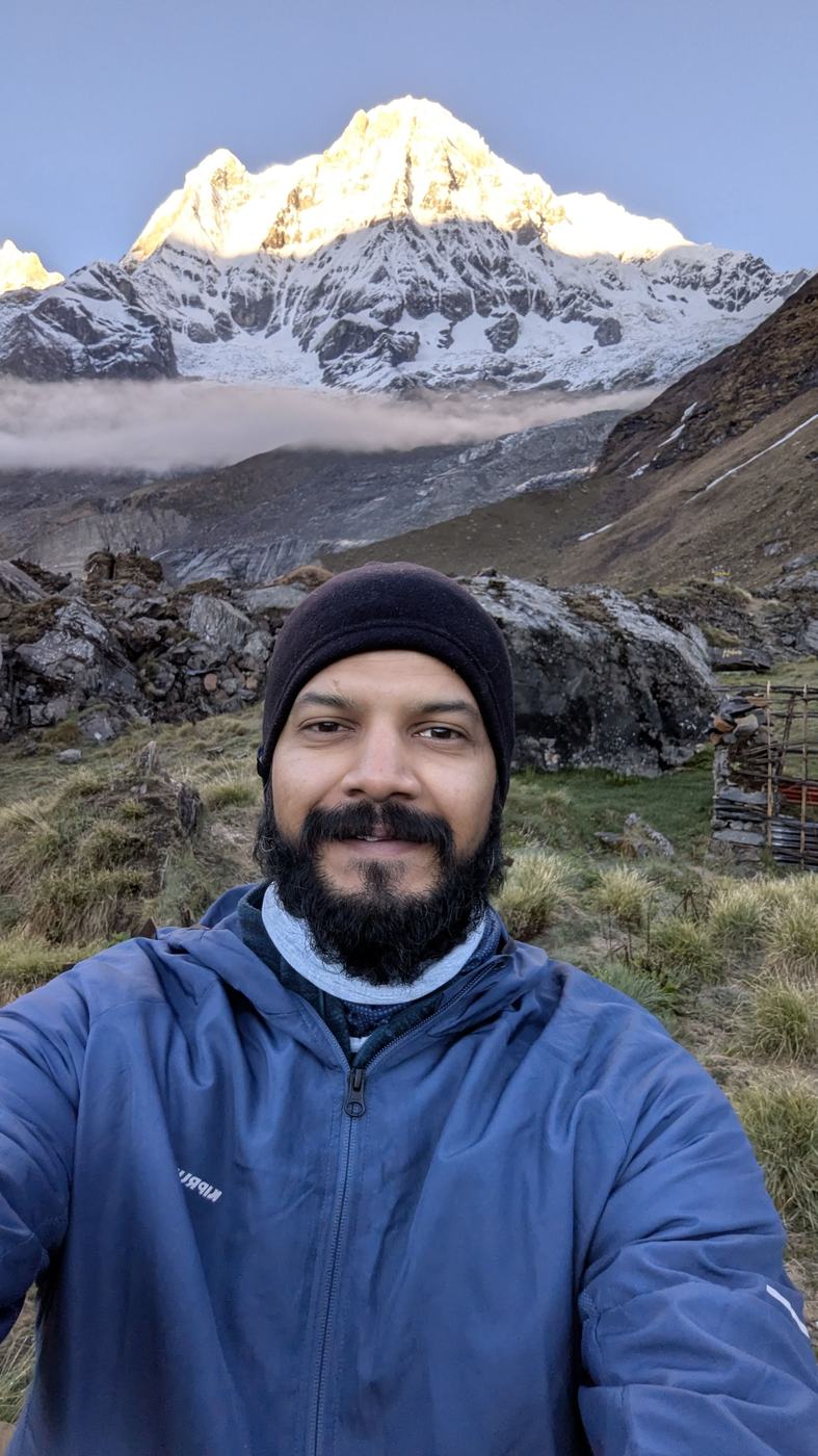 Anurag in front of a snow peak