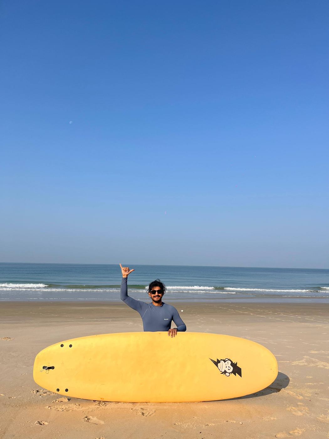Beach with a surfboard